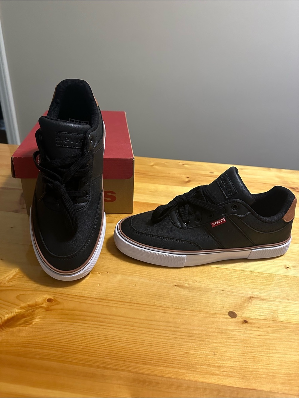 Levi's Black Sneakers with White Sole and Brown Heel Accent